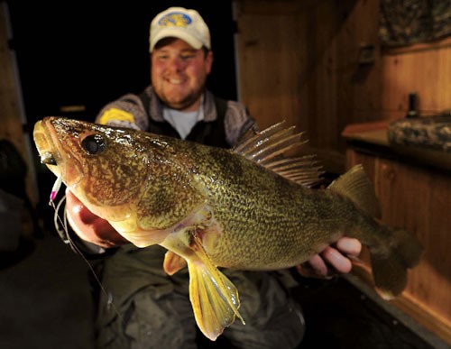 Big ol' walleye caught ice fishing with our Demon!