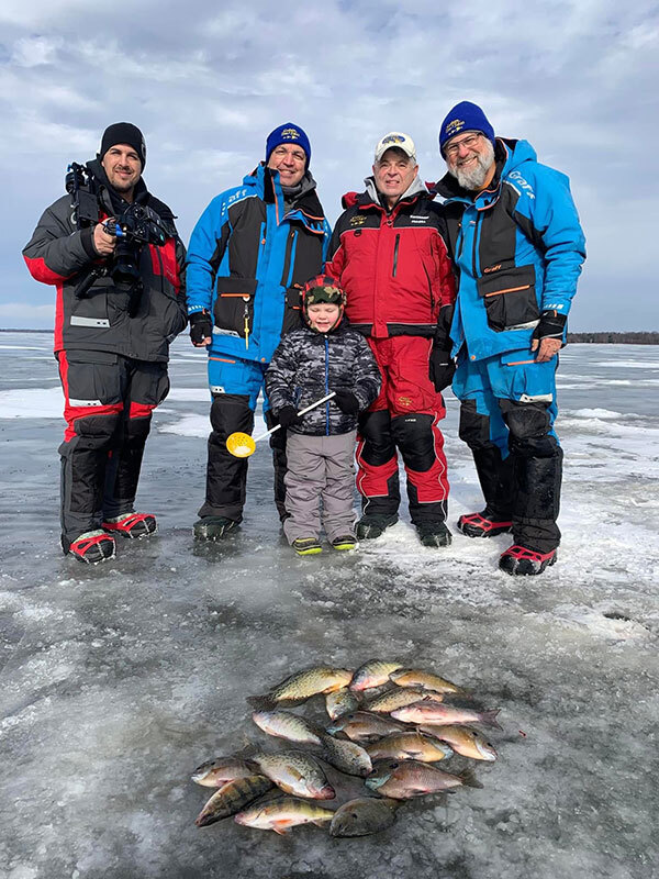 The entire gang in front of a pile of bluegill