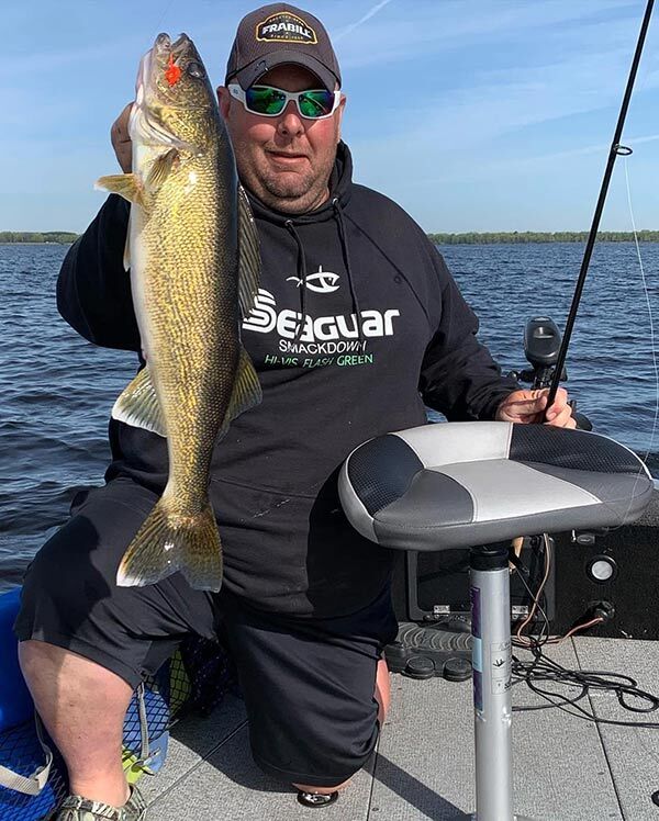 Wisconsin Guide Jesse Quale with a large walleye on a smaller 1/8th ounce Draggin’ Jig!