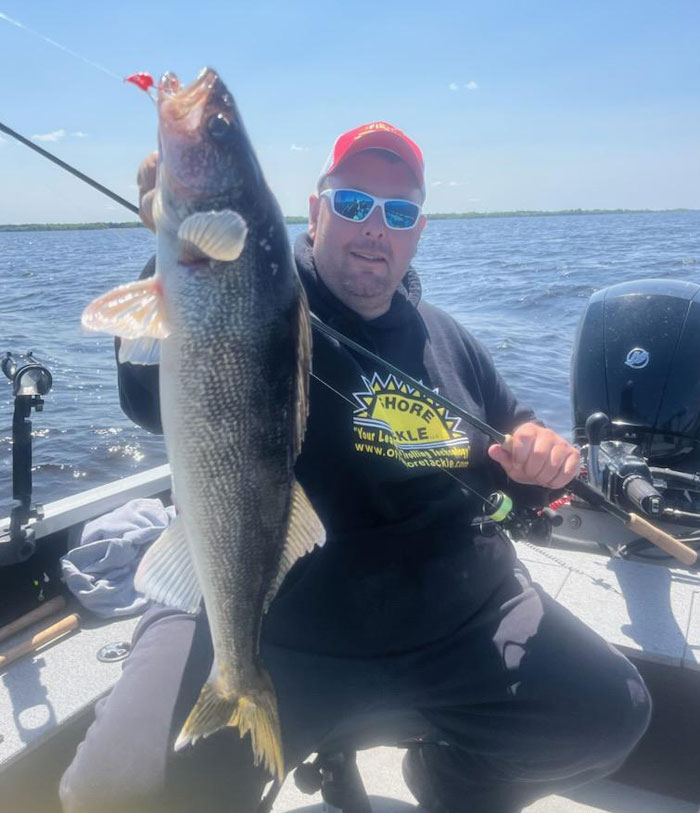 Wisconsin Guide Jesse Quale hooked a whopper on an orange Draggin’ Jig!