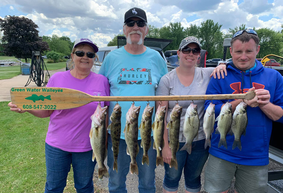 Green Water Walleyes showing off their white bass catch of the day