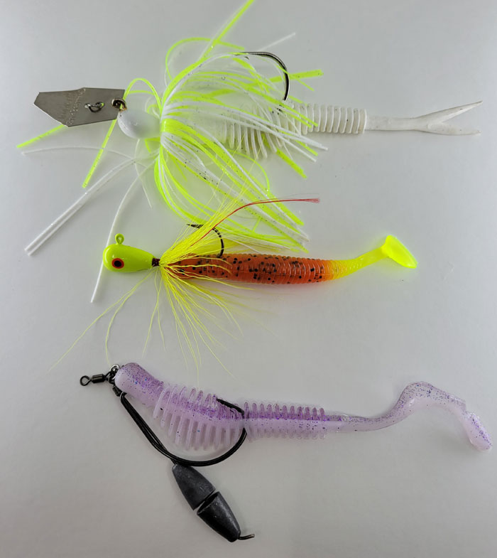 A collection of Authentix plastics including the Ribb Finn, Paddle Tail and Pulse R