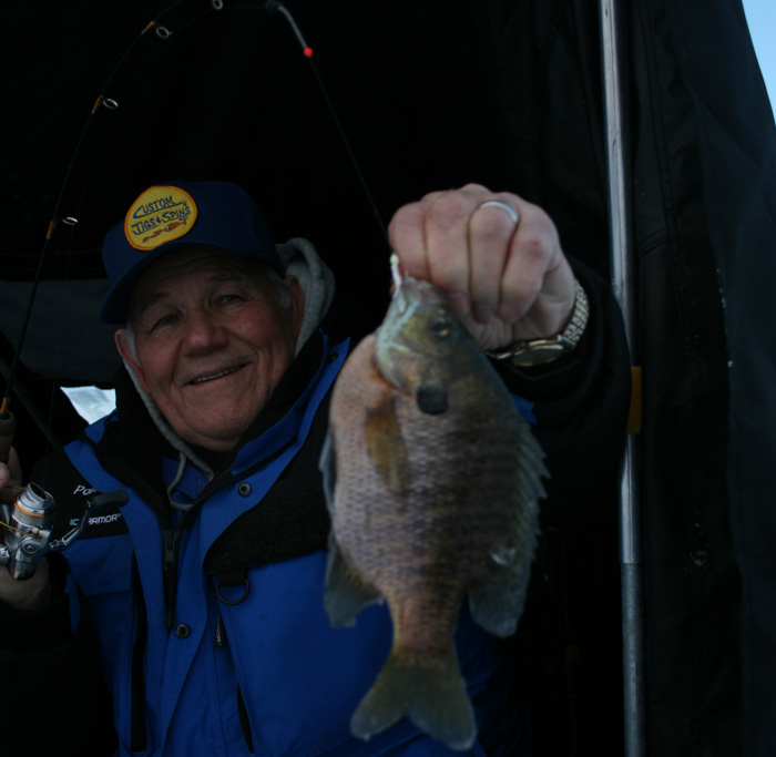 Poppee is holding up a fat crappie!