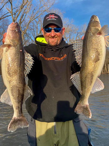 Two gorgeous walleye caught on our lures with the fisherman