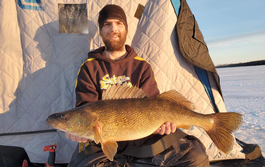 Wilson Magers Megeglow with a giant walleye!