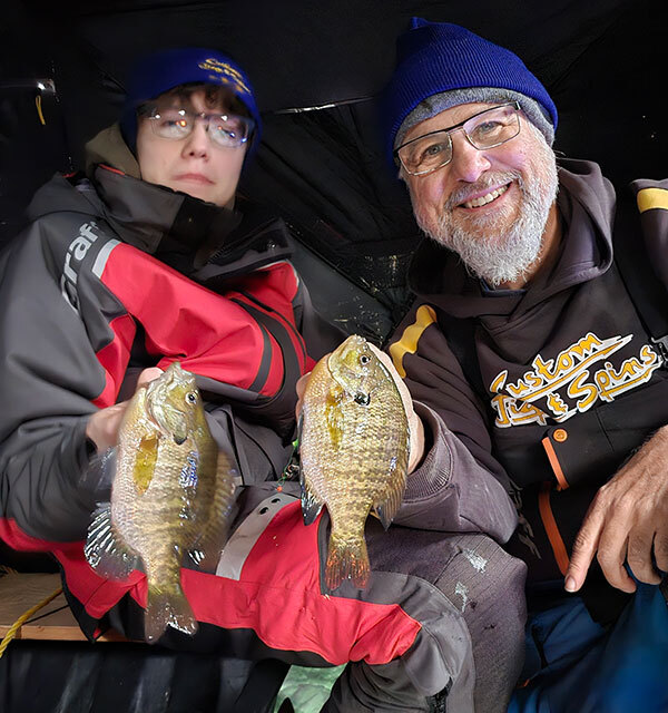 Walt and son showing off a couple of bluegills