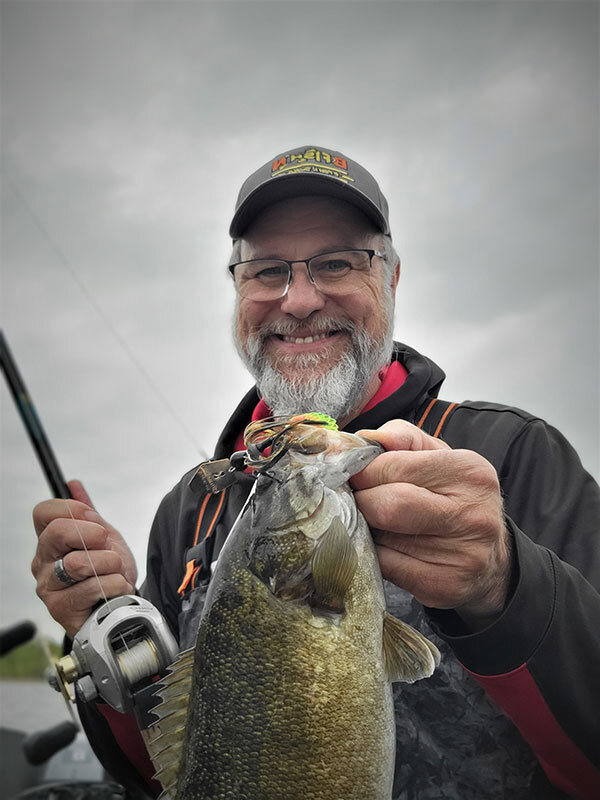 Walt with another smallmouth bass on the hook