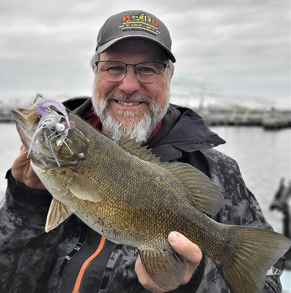 Walt holding a smallmouth bass
