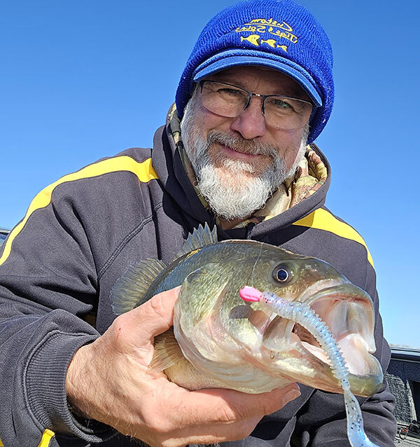 Walt holding a Bass he just caught