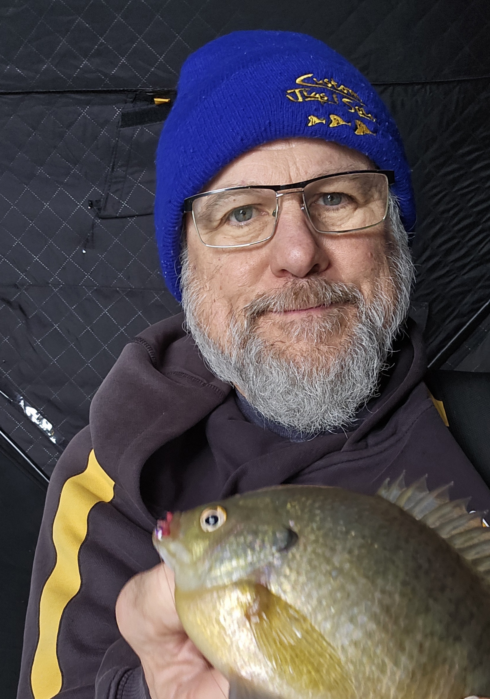 Yep, you guessed it. Walt holding up a big fat bluegill!