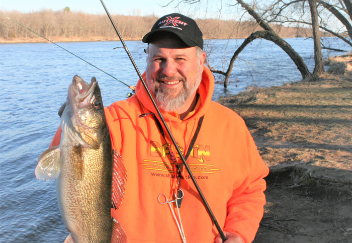 Walt holding up a big early season walleye