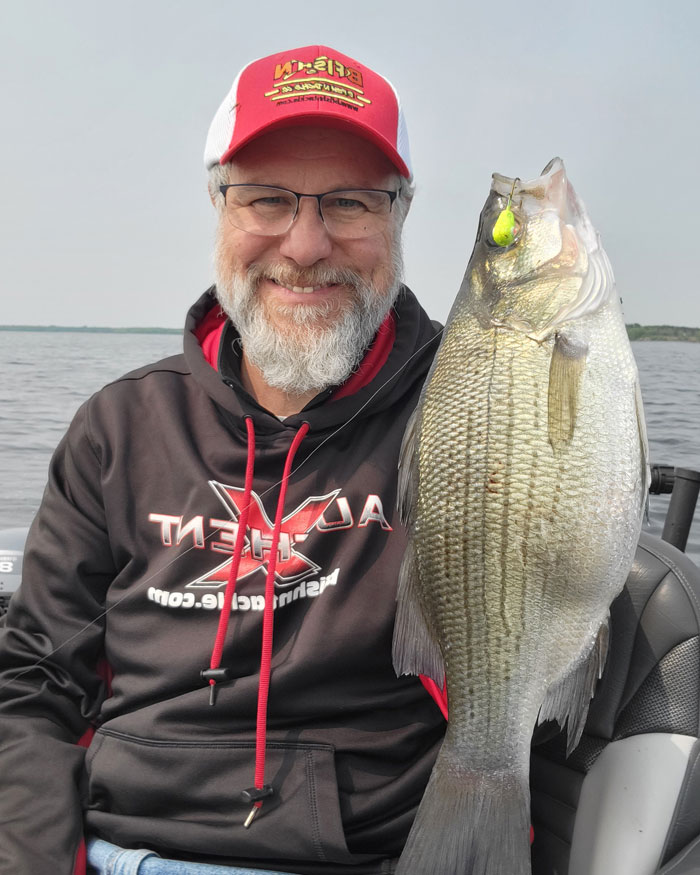 Walt with a 14” White bass caught in a sunken tree