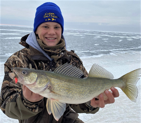 Wilson holding one gorgeous pike!