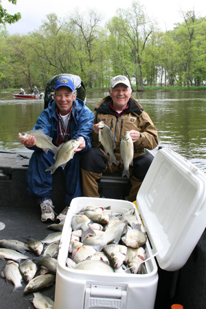 Walt Baumgartner and Poppee with a few white bass on the Flu-Flu double rig, LOL